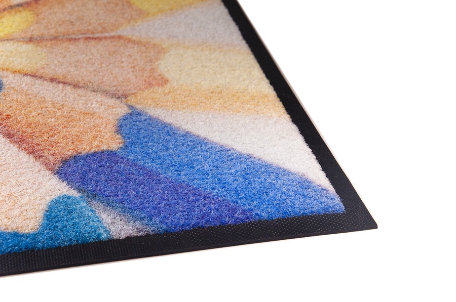 Détail des fibres d'un tapis personnalisé